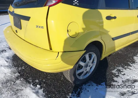 2005 Ford Focus Zx5 z USA, uszkodzony, nr VIN 3FAHP37N75R125351